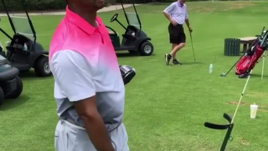 Watch: Tiger and JT give club twirl lessons
